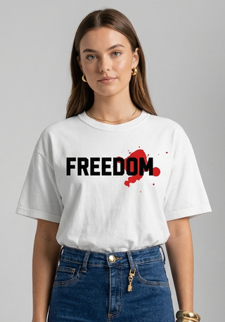 Freedom in Christ Christian t-shirt waist-up detail shot showing bold FREEDOM. graphic - Faith & Co Apparel